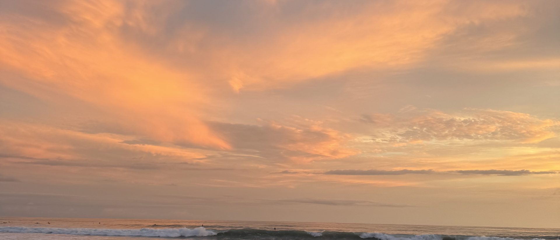 Pacific sunset over a Costa Rican surf beach near SELVA Longevity