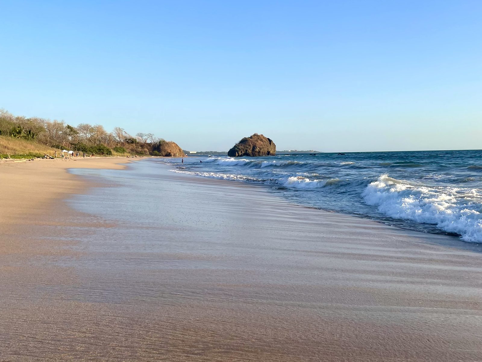 An open Pacific beach with a headland near SELVA Longevity, Costa Rica
