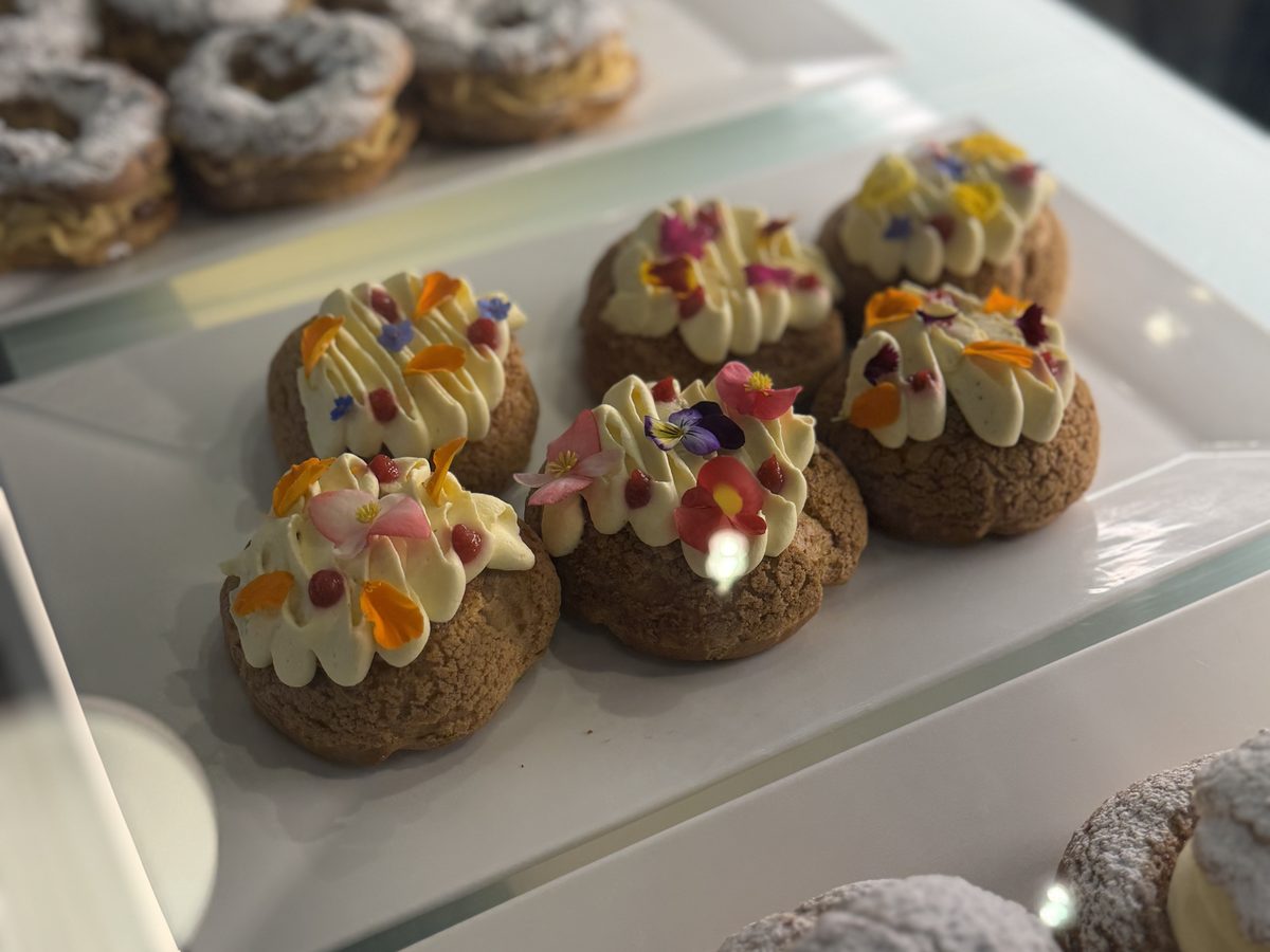 Artisan pastries decorated with edible flowers