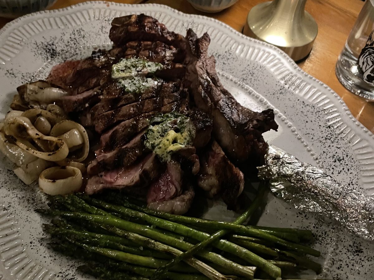Premium grilled steak plated with vegetables